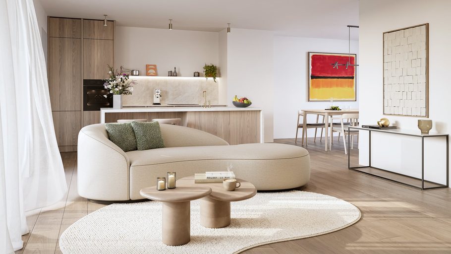 Living room with a curved sofa, open kitchen and dining area in natural light.