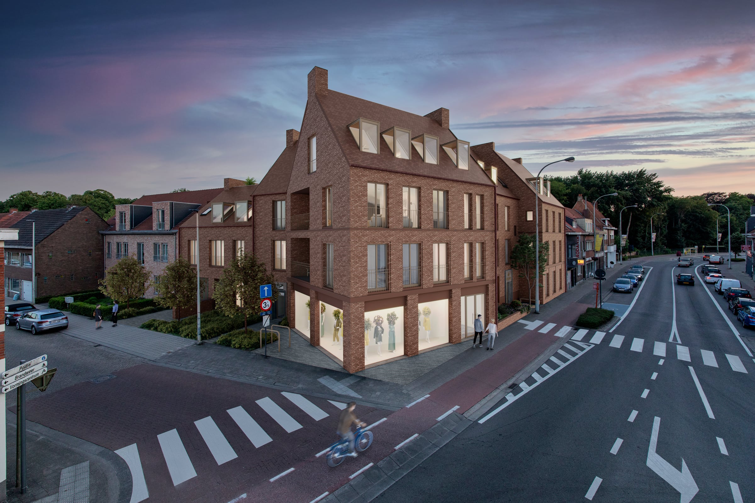 De Post — appartementengebouw geïntegreerd in het straatbeeld bij avondlicht